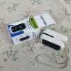 RELOIVE Fingertip Pulse Oximeter - Medical Grade Blood Oxygen Saturation Monitor with OLED Display, Batteries & Lanyard Included - ±2% Clinical Accuracy